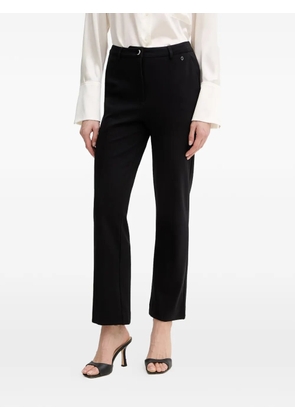 GUESS USA logo-plaque trousers - Black