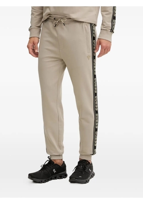GUESS USA logo-tape track pants - Neutrals