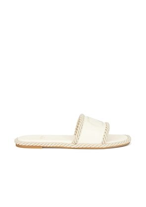 Valentino Garavani V Logo Torchon Slide Espadrilles in Ivory - Ivory. Size 36 (also in 40).