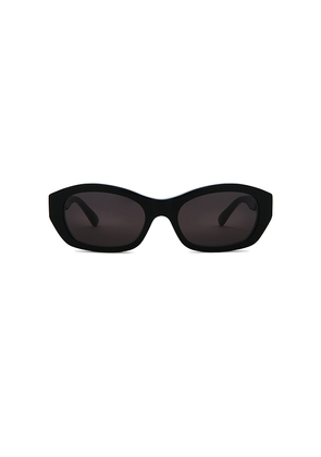 Balenciaga Oval Sunglasses in Black.
