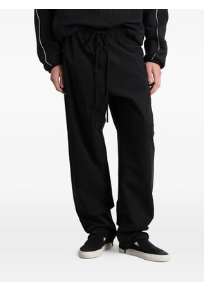 FEAR OF GOD ESSENTIALS Essentials logo-patch track pants - Black