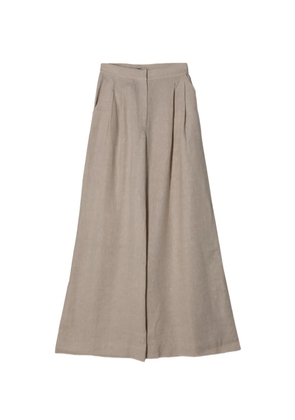 ANDRES OTALORA Ama Y Haz pleated trousers - Neutrals