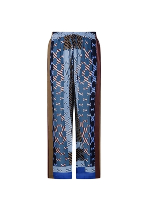 mapoésie Max Pollen abstract-print trousers - Blue