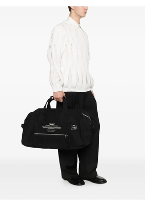 Undercover zip-pocket tote bag - Black