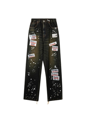 Maison MIHARA YASUHIRO sticker-patch stud-embellished jeans - Black