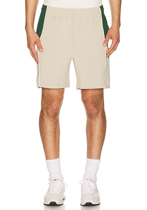 Students Golf Exhibition Track Shorts in Sand - Tan. Size L (also in S, M, XL/1X).