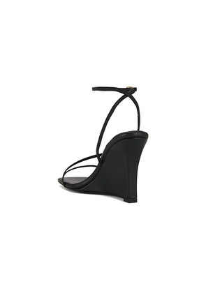 Jeffrey Campbell Highlight Wedge Sandal in Black. Size 6. Also in 6.5, 7, 7.5, 8, 8.5, 9, 9.5, 10.