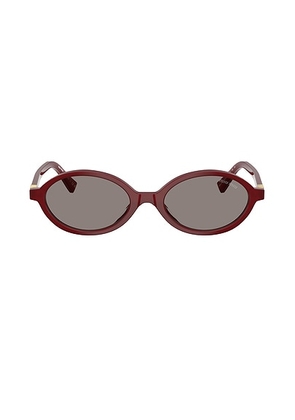 Miu Miu Oval Sunglasses in Red - Red. Size all.