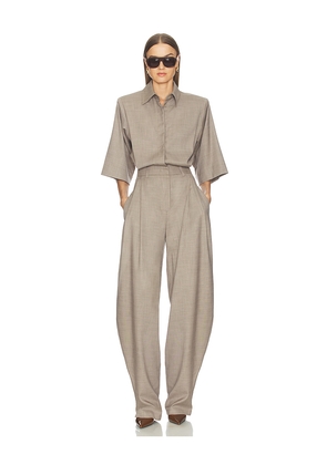 The Andamane Axel Padded Shoulder Jumpsuit in Beige. Size 40/S. Also in 38/XS.