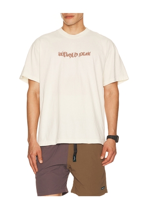 Afield Out Stone T-Shirt in Cream. Size S. Also in M, L, XL/1X.