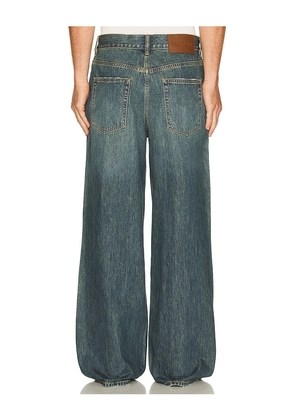 Helmut Lang Destroyed Denim in Blue. Size 30. Also in 31, 33.