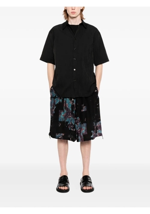 Yohji Yamamoto abstract-print wide-leg shorts - Black