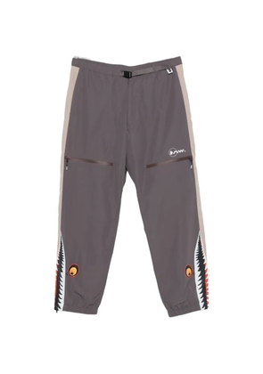 A BATHING APE® x Kazuki Kuraishi elasticated-cuffs track pants - Grey