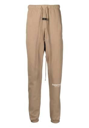 FEAR OF GOD ESSENTIALS logo-print track-pants - Brown
