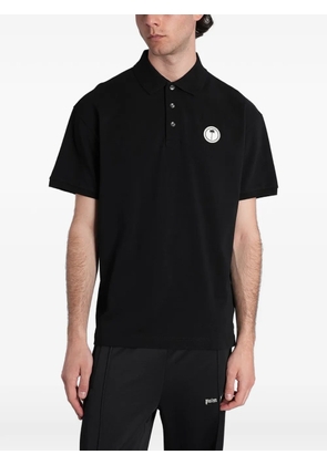 Palm Angels logo-patch polo shirt - Black