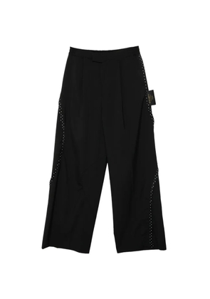 Undercover pattern-trim trousers - Black