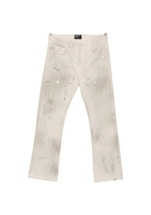 Enfants Riches Déprimés paint-splatter straight-leg jeans - Neutrals