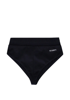 VETEMENTS logo-print jersey shorts - Black