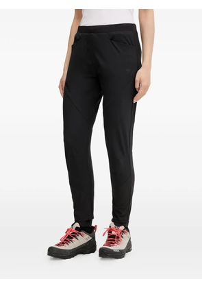 DYNAFIT logo-print panelled trousers - Black