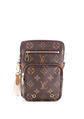 Louis Vuitton Pre-Owned Utility Phone Sleeve Bag Monogram Canvas crossbody bag - Brown