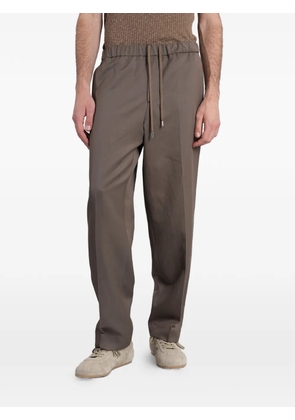 Costumein drawstring-waist pressed-crease trousers - Brown