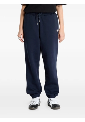 GUESS USA logo-patch drawstring track pants - Blue