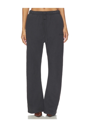 Fear of God ESSENTIALS Signature Classic Fit Flare Sweatpant in Black. Size XS. Also in S, M, L, XL.