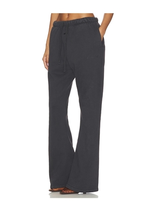 Fear of God ESSENTIALS Signature Classic Fit Flare Sweatpant in Black. Size XS. Also in S, M, L, XL.