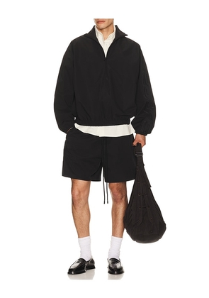Fear of God ESSENTIALS Active Trace Classic Short in Black. Size XS. Also in S, M, L, XL/1X, XXL/2X.