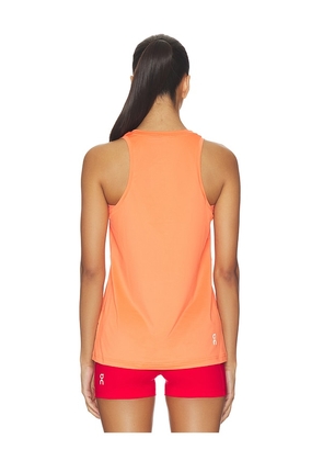 On Core Tank in Coral. Size XS. Also in S, M, L.