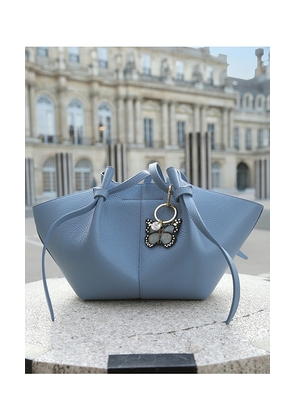 Solar Eclipse Hand-painted Monarch Bag Charm & Keychain in Baby Blue.