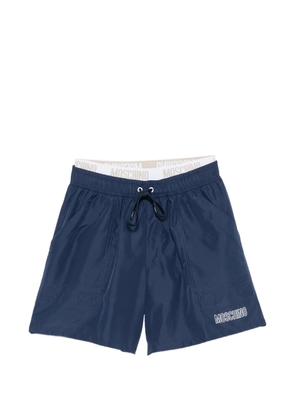 Moschino logo-print drawstring swim shorts - Blue