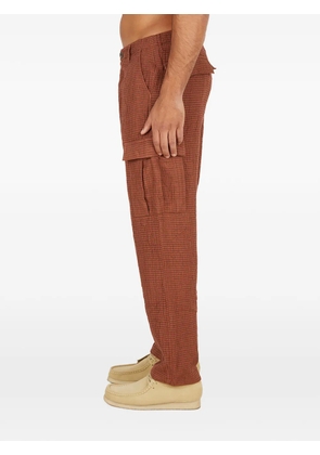 Kara graphic patch-pocket trousers - Red