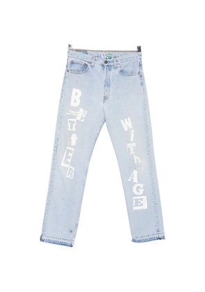 Better with Age logo-print raw-cut jeans - Blue
