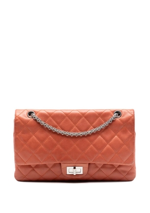 CHANEL Pre-Owned 2010-2011 Quilted Lambskin Reissue 2.55 Double Flap 227 shoulder bag - Orange