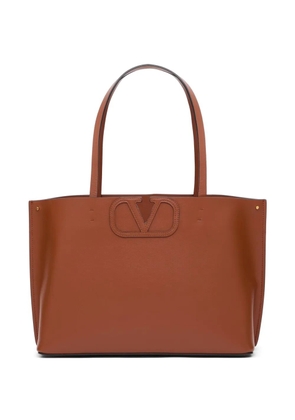 Valentino Garavani Fill Me small calfskin shopping bag - Brown