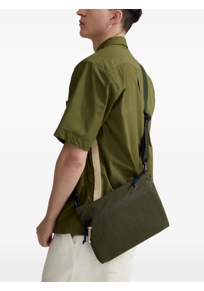 Universal Works x Master-piece logo-print zip-fastening shoulder bag - Green