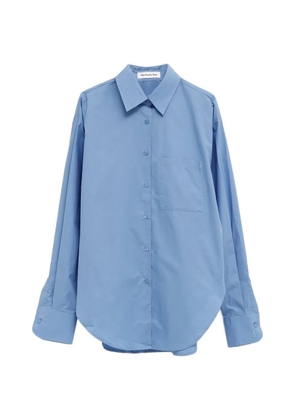 The Frankie Shop Lui chest-pocket curved-hem shirt - Blue