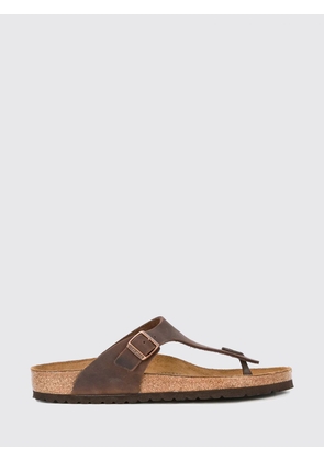 BIRKENSTOCK Sandals Men color Brown