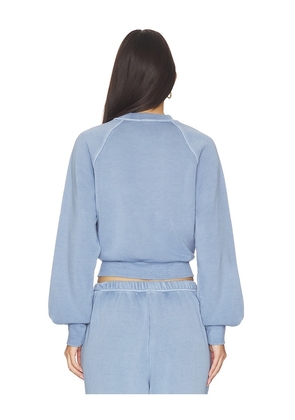 Beyond Yoga Raglan Crew Sweatshirt in Blue. Size S. Also in XS, XL.