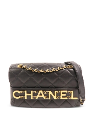 CHANEL Pre-Owned quilted enchained flap crosssbody bag - Black