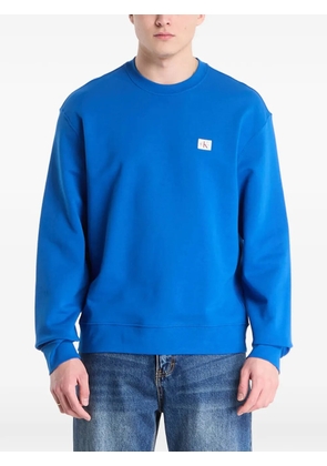 Calvin Klein logo-patch long-sleeve sweatshirt - Blue