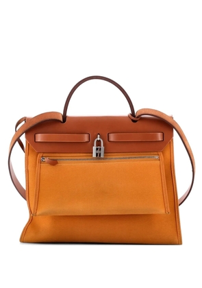 Hermès Pre-Owned Herbag Zip Leather and Toile 31 shoulder bag - Brown