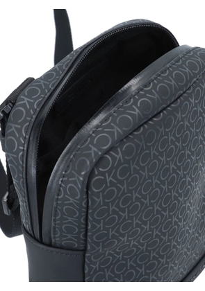 Calvin Klein monogram-embossed shoulder bag - Black