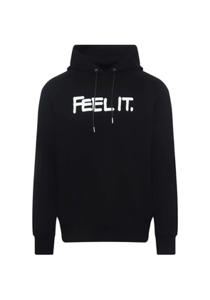 sacai Eric Haze slogan-print hoodie - Black