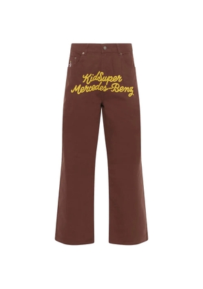 KidSuper x Mercedes Benz logo-embroidered wide-leg trousers - Brown