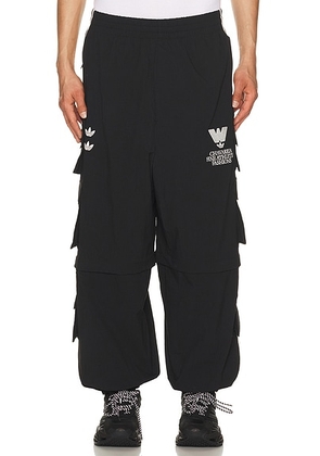 Adidas Originals x Willy Chavarria Cargo Pant in Black - Black. Size S (also in M, L).