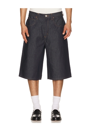 AGOLDE Fusion Skater Short in Black. Size 29. Also in 30, 31, 32, 33, 34, 36.