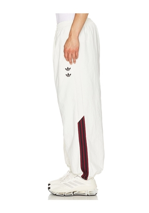 adidas Originals x Willy Chavarria Woven Track Pants in White. Size S. Also in M, L, XL/1X.