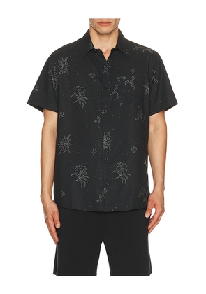 TravisMathew Techwoven Holding Court Shirt in Black. Size S. Also in M, L, XL.